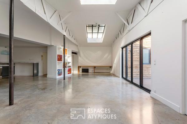 Loft intimiste rénové avec patio et garage