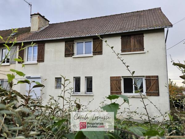 Maison familiale avec travaux, au calme, en centre-ville