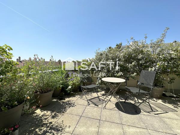 Un grand attique au sein d'un parc privé !