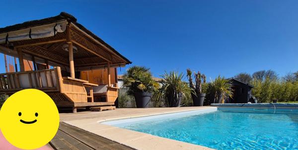 Prestation qualitative : Plain-Pied de 125 m2, parcelle paysagée de 1400 m2, piscine et paillotte