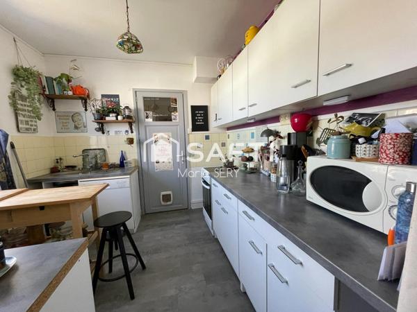 Maison avec jardin, alliant calme et proximité des commodités