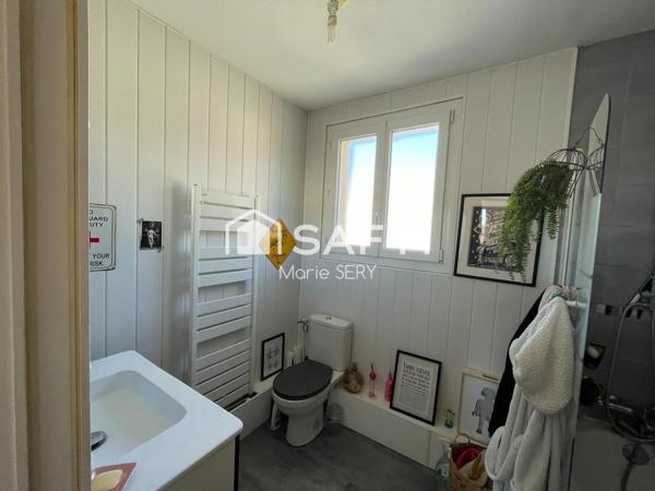 Maison avec jardin, alliant calme et proximité des commodités