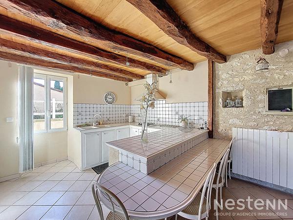 A Vendre Maison en pierre rénovée de 175 m² avec jardin et garage dans un hameau de Condom