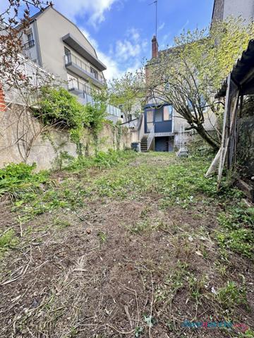 Maison de ville avec jardin rénovée avec goût