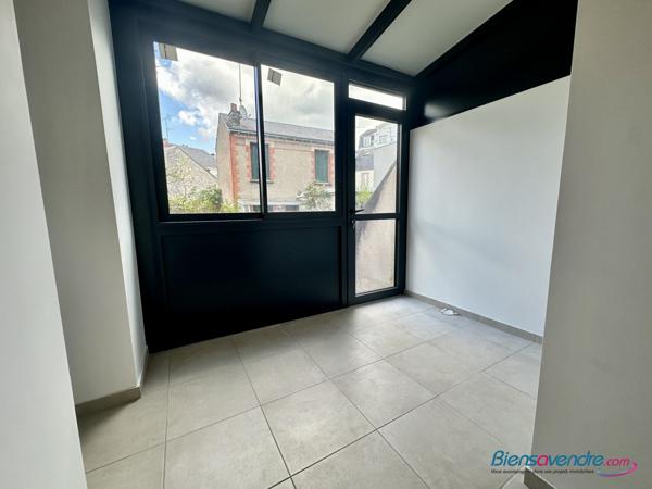 Maison de ville avec jardin rénovée avec goût