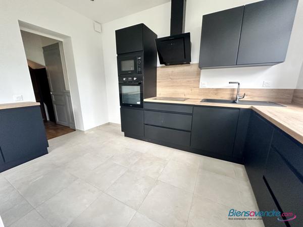 Maison de ville avec jardin rénovée avec goût