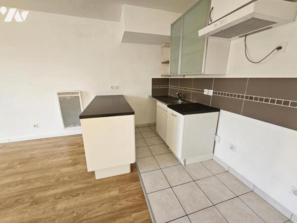 SAINT-HERBLAIN BOURG, appartement 2 chambres, balcon et parking en sous-sol