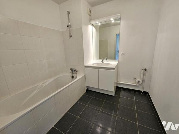 SAINT-HERBLAIN BOURG, appartement 2 chambres, balcon et parking en sous-sol