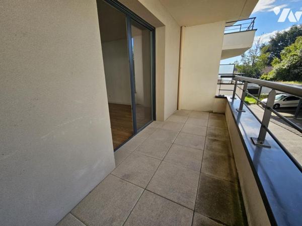 SAINT-HERBLAIN BOURG, appartement 2 chambres, balcon et parking en sous-sol