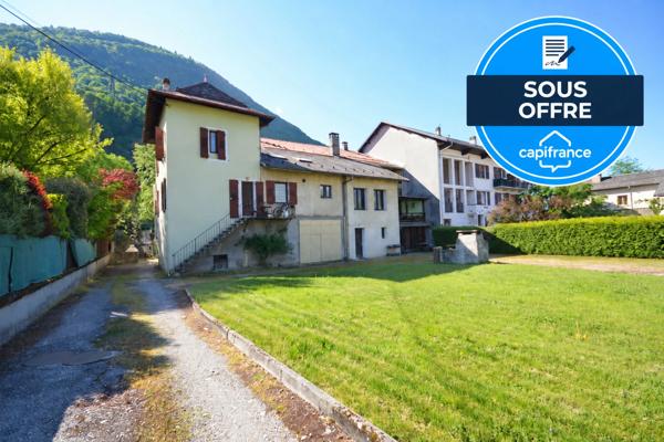 ENSEMBLE IMMOBILIER DE 8 APPARTEMENTS + MURS COMMERCIAUX – TERRAIN DE 2 070 m²