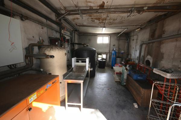 ENSEMBLE IMMOBILIER DE 8 APPARTEMENTS + MURS COMMERCIAUX – TERRAIN DE 2 070 m²