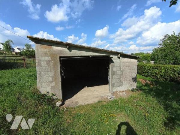 Centre-ville de Condé sur Noireau , une maison d'habitation individuelle à rénover de cinq pièc...