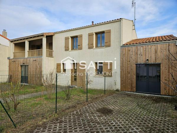 Appartement sans travaux en plein centre bourg deux chambres et balcon