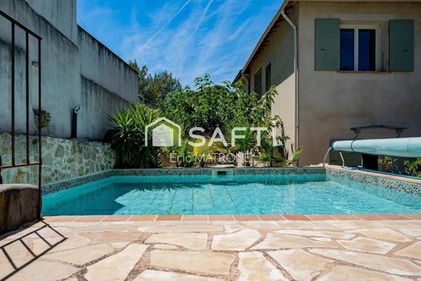 Maison 9 pièces avec piscine et garages