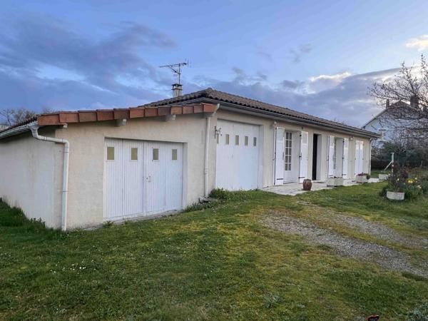 MAISON AVEC GARAGE ET TERRAIN