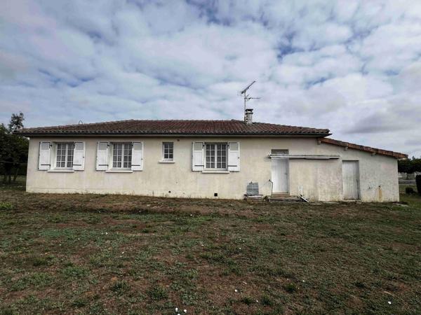 MAISON AVEC GARAGE ET TERRAIN