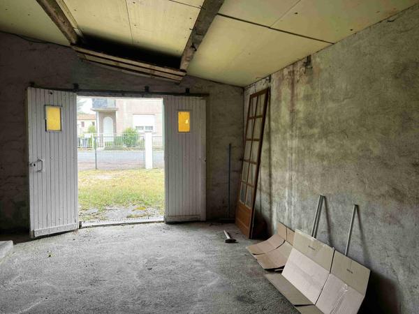 MAISON AVEC GARAGE ET TERRAIN