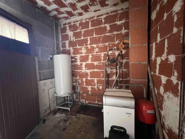 MAISON AVEC GARAGE ET TERRAIN