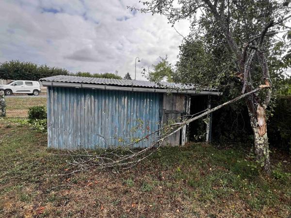 MAISON AVEC GARAGE ET TERRAIN