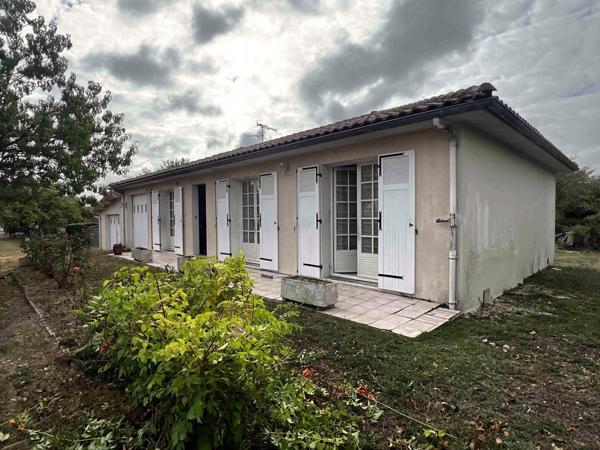 MAISON AVEC GARAGE ET TERRAIN