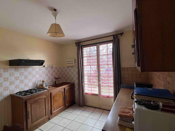 MAISON AVEC GARAGE ET TERRAIN