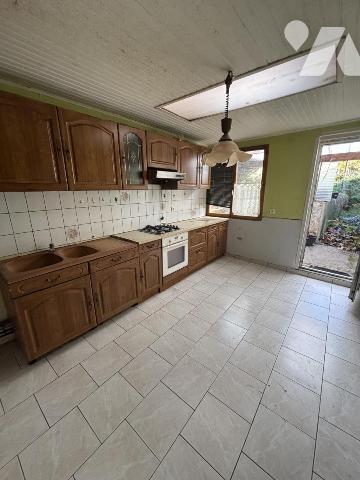 Amiénoise à rénover quartier Montières avec jardin