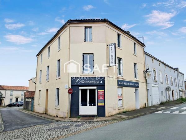 Ancien local commercial avec vaste habitation – Idéal investisseur ou projet de vie