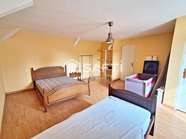 Ancien local commercial avec vaste habitation – Idéal investisseur ou projet de vie