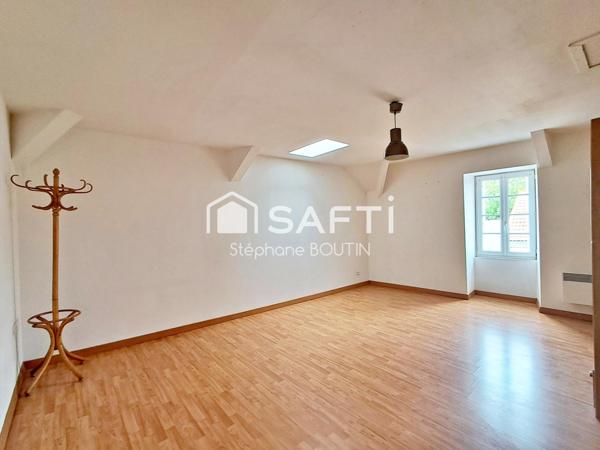 Ancien local commercial avec vaste habitation – Idéal investisseur ou projet de vie