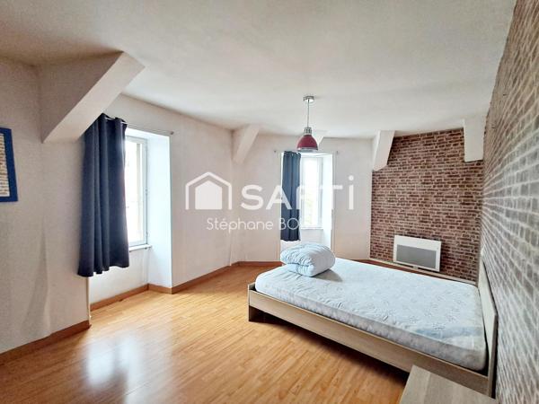 Ancien local commercial avec vaste habitation – Idéal investisseur ou projet de vie