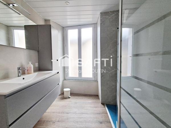 Ancien local commercial avec vaste habitation – Idéal investisseur ou projet de vie