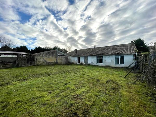 Maison de type 2 de plain-pied avec jardin