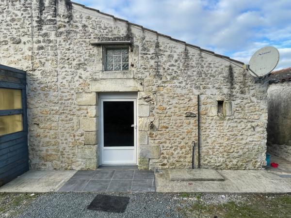 Maison de type 2 de plain-pied avec jardin