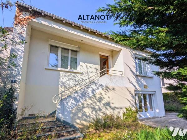 Maison 2 niveau - Garage - Terrain 