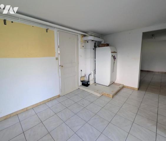 Maison 2 niveau - Garage - Terrain 