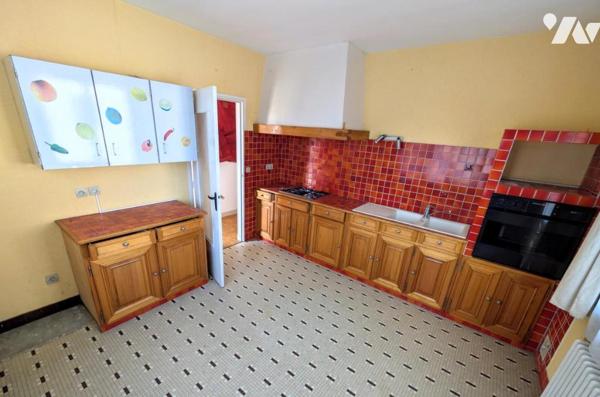 Maison 2 niveau - Garage - Terrain 