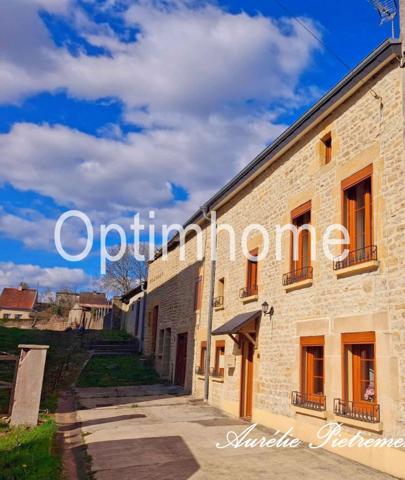 Maison à rafraîchir avec un atelier, un garage et terrain à Douzy