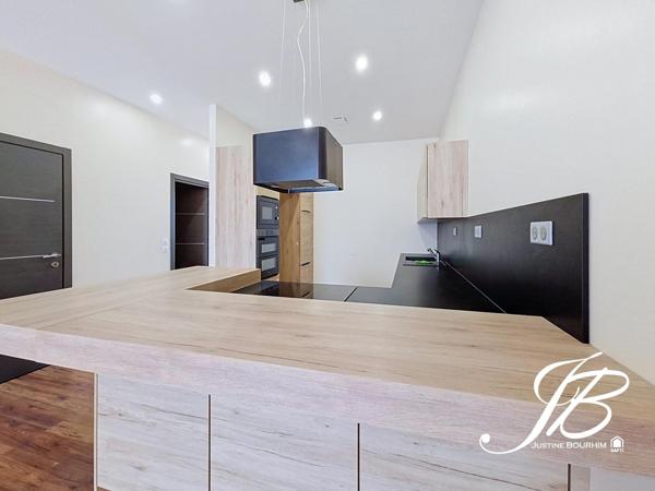 LOFT RENOVE DE 118M² AVEC TERRASSE ET PARKING COUVERT
