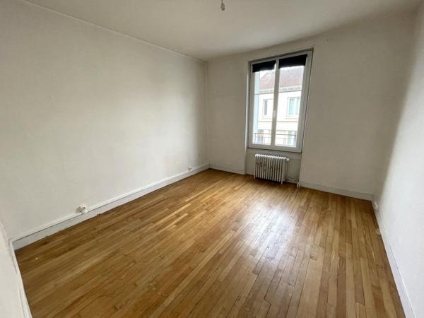 Maison avec garage et jardin quartier Ernest Ruben