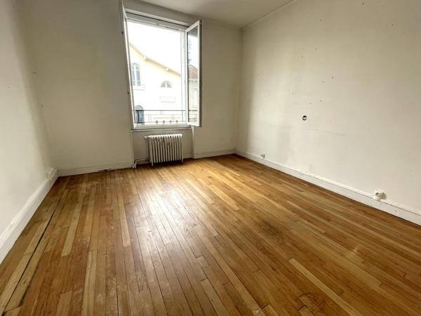 Maison avec garage et jardin quartier Ernest Ruben