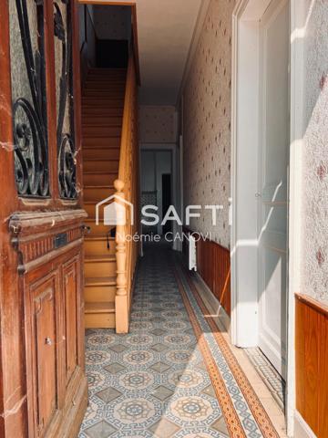 Maison semi-individuelle à rénover – 85 m² avec jardin