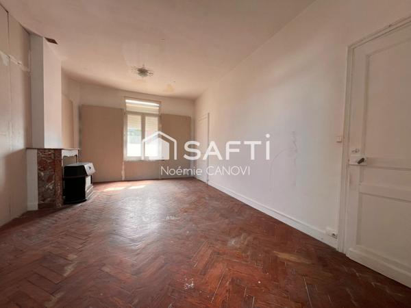 Maison semi-individuelle à rénover – 85 m² avec jardin