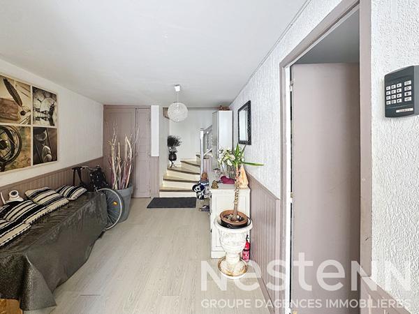 Maison de 126 m², terrasse et T2 indépendant en centre ancien.
