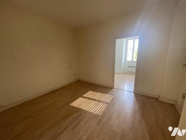 UN APPARTEMENT T3 + CAVE + JARDIN