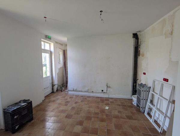 Ensemble immobilier divisible avec jardin et garage