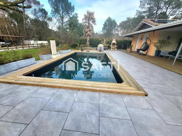 Maison à Marcheprime avec un grand terrain et piscine au calme