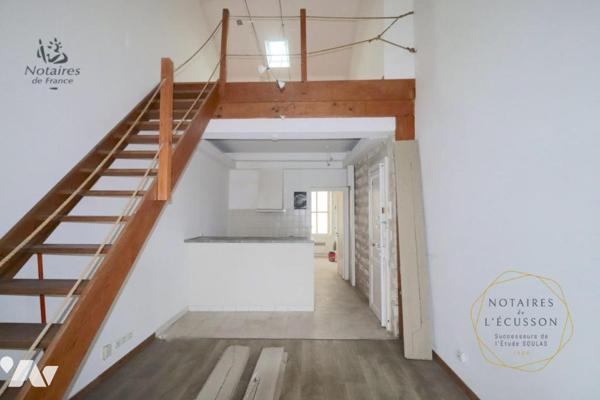 Appartement T2 avec mezzanine, jardinet et cave