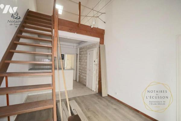 Appartement T2 avec mezzanine, jardinet et cave