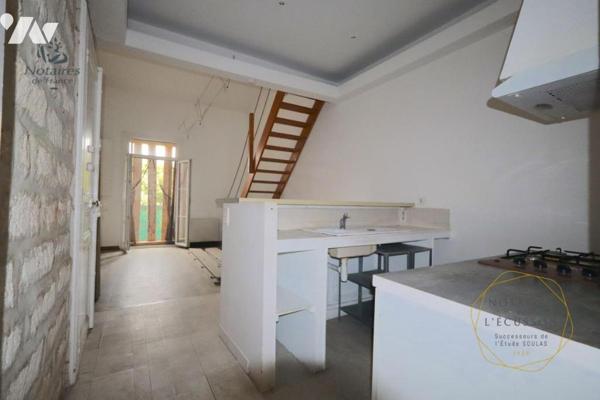 Appartement T2 avec mezzanine, jardinet et cave
