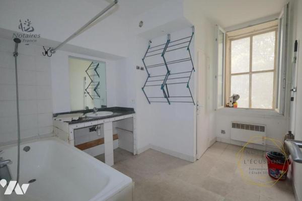 Appartement T2 avec mezzanine, jardinet et cave